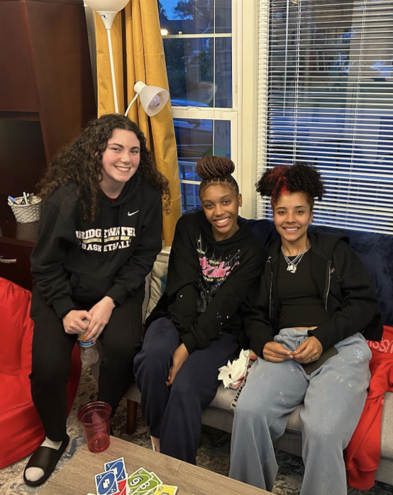 A small glimpse of the great times that were had at BSA’s third annual cookout,  only three of the many smiles that were at the cookout. Students played a competitive Uno game and shared Bojangles catering.